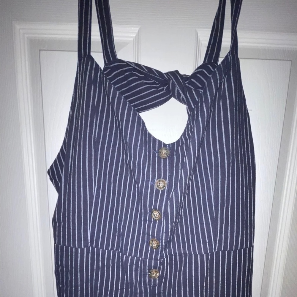 Navy button front pinstripe jumpsuit. Size Large NWT